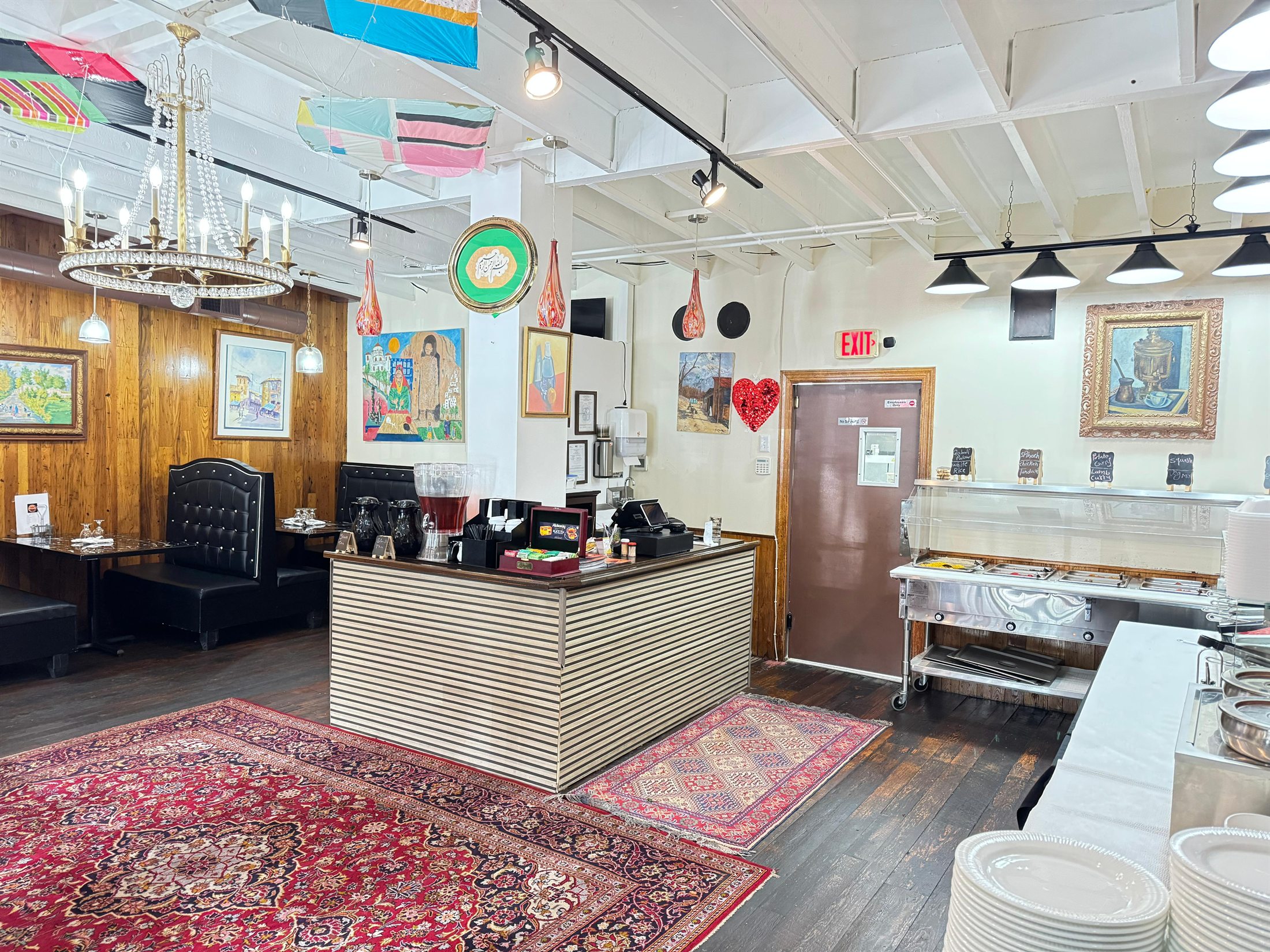Afghan Kabob House front counter and buffet area with Afghan rugs
